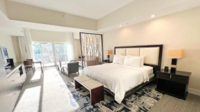 Private Studio - King bed, bath tub with spa jets, balcony and pool